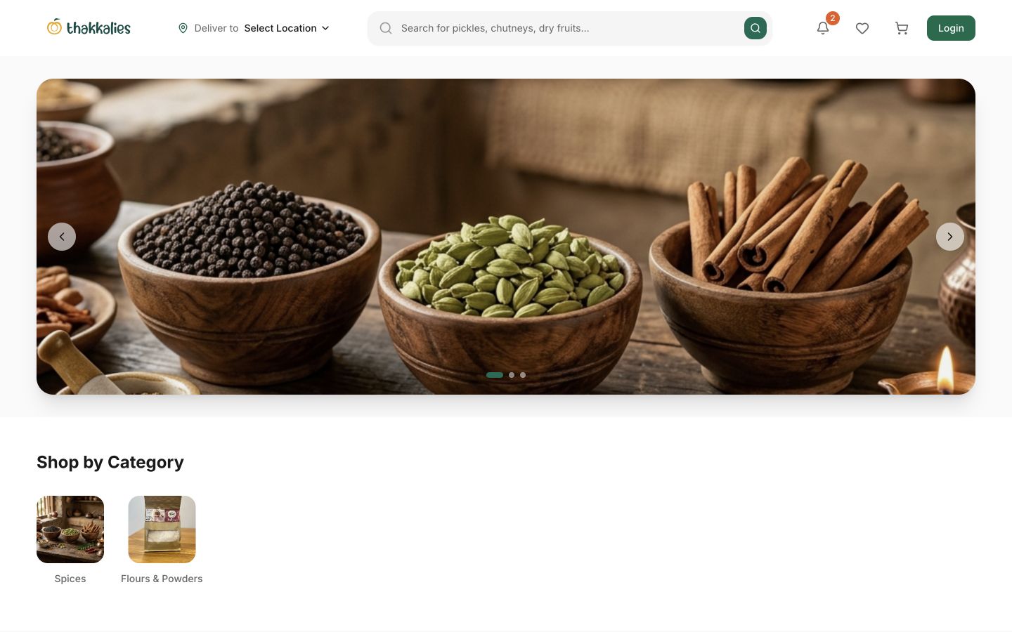 Live Thakkalies food marketplace homepage displayed inside the laptop